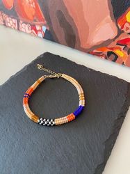 Beaded woven bracelet, peach orange royal blue abstract bracelet, hippie western bohemian casual handcrafted jewelry