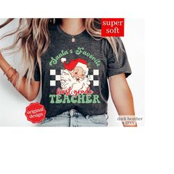 Santa's Favorite Teacher Shirt, Christmas Teacher Shirt, Christmas Gift For Teacher, Santa's Best Teacher, First Grade T