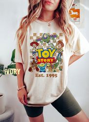 Comfort Colors Disney Toy Story Est 1995 shirt, Disney Toy Story Characters Group shirt, Disney Family Vacation Trip, To