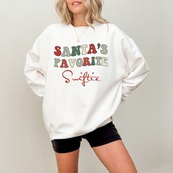 Santa Swiftie Sweatshirt, Funny Swiftmas Christmas Gift, Country Concert In My Xmas Era Shirt, Santa's Favorite Holiday