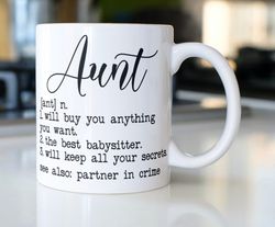 definition of an aunt coffee mug stating  1 i will buy you anything you want 2 the best babysitter 3i will keep all your