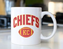 kansas city football coffee mug stating  with kc in football