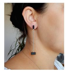 Minimalist ebony earrings. Stylish earrings on chains.