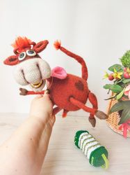 Bull stuffed animal toy amigurumi. Crocheted toy bull with an accordion and gold teeth. Cuddly bull soft toy handmade.