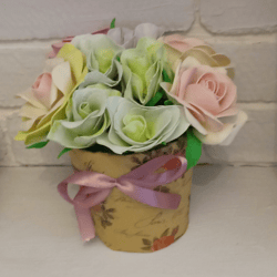 Beautiful composition of roses and eustomes in delicate colors. Handmade