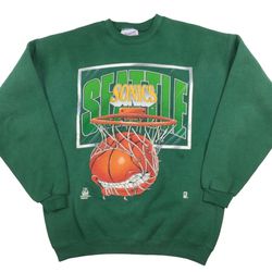 Vintage Seattle Supersonics NBA Crewneck sweatshir Tagged as a large 22 inches pit to pit, 28 inches long Made in the US