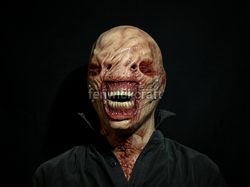 Silicone mask of the Chatterer/From the movie "Hellraiser"