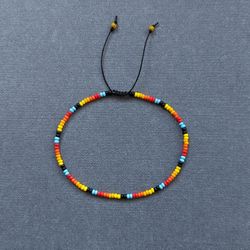 Thin beaded men's bracelet in colorblock design