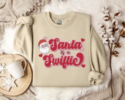 Taylor Swiftie Christmas Sweater, Santa is a Swiftie Sweatshirt, Holiday Sweater for Swifties, Festive Xmas Apparel, Swe