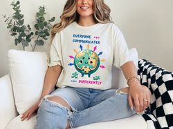 Everyone Communicates Differently Autism Awareness Month Teacher Special Education T-Shirt