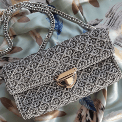 Small evening crochet bag with chain strap