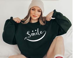 Smile SVG / Fine and Fancy Black Cursive / Script Capitalized Word "Smile" w/ Happy Face Eyes Design - Digital