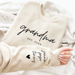 custom grandma sweatshirt with grandchildren names on sleeve