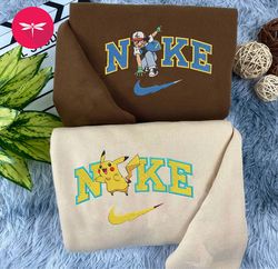 Nike Pikachu And Satoshi Embroidered Hoodie, Pokemon Couple Nike Embroidered Sweater, Disney Movie Nike Embroidered CP52