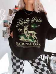 North Pole Sweatshirt National Park Shirt Vintage Christmas Crewneck National Park Gift for Her Retro Santa Claus Shirt