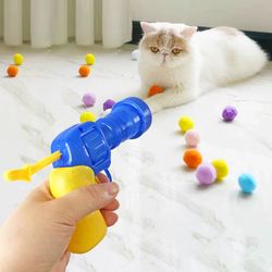 Engaging Launch Training Cat Toys: Mini Shooting Games with Stretch Plush Balls for Kittens - Pet Accessories