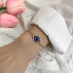 Fashionable Adjustable Evil Eye Bracelet for Women in Gold and Silver Colors with Lucky Chain and Zircon Accents