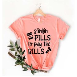 slingin pills to pay the bills shirt, pharmacist, pharmacy tech, gift for pharmacist, future pharmacist, pharmacy school