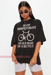 NEVER Underestimate An Old Guy On A Bicycle, Funny Cycling Gift Tee for Men, Dad