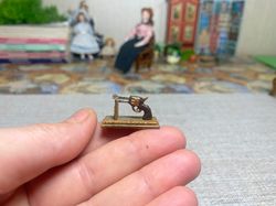 Museum exhibit. 1:12. Pistol on a stand. Dollhouse miniature.