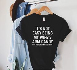 Funny Husband Shirt,Anniversary Gift,Funny Shirt Men,Husband Gift,Fathers Day Tee,Its Not Easy Being My Wifes Arm Candy,