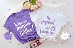 he popped the question shirt, we're poppin' bottles shirt, champagne bachelorette party shirts, funny bridesmaid shirt