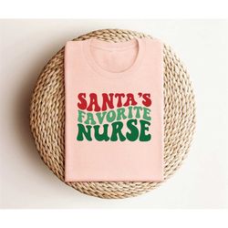 santa's favorite nurse shirt, minimalist santa christmas tshirt, santa christmas shirt, santa's fav christmas shirt, uni