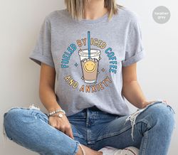 fueled by iced coffee and anxiety shirt, funny tshirt, coffee graphic tees, anxiety shirt, funny coffee shirt, gift for