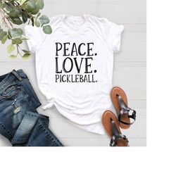 peace love pickleball,pickleball shirt,pickleball player gift,pickleball coach,pickleball outfit,pickleball lover tee,pi