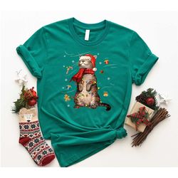 cat mom christmas santa hat shirt, meowy christmas sweatshirt, cat owner christmas t-shirt, santa hat kitten tee, cat lo