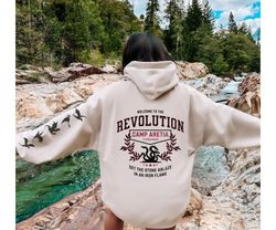 Iron Flame Revolution Hoodie with sleeve dragons, welcome to the revolution on back with left s