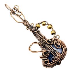Blue Serenade: Sodalite Copper Wire Wrapped Guitar Pendant for Musical Elegance and Artistic Expression