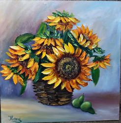 Sunny sunflowers in a basket. Painting flowers.