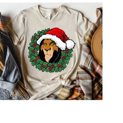Disney Santa Scar Christmas Wreath TShirt, Disney The Lion King Shirt, Disneyland Christmas Party Matching Gift, Christ