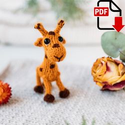 Tiny Giraffe knitting pattern. Knitted amigurumi giraffe miniature step by step tutorial. DIY tiny gift.