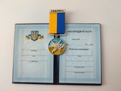 UKRAINIAN TRIDENT AWARD MEDAL "FOR THE DEFENSE OF UKRAINE. AVDIIVKA" WITH DOC GLORY TO UKRAINE