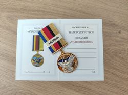 UKRAINIAN AWARD MEDAL "PARTICIPANT OF THE WAR. AVDIIVKA" WITH DOCUMENT. GLORY TO UKRAINE