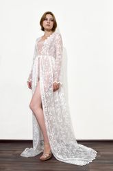 Elegant long lace white peignoir with train and long sleeves. Floral pattern