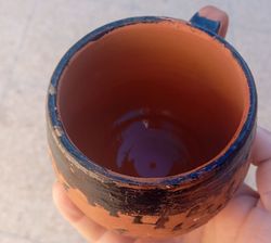 Handmade Moroccan Clay Cup adorned with traditional tar paint