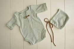 Newborn boy sage green romper and hat outfit photo prop.