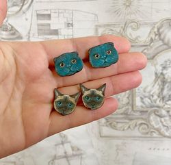Interesting handmade earrings. For cat lovers).