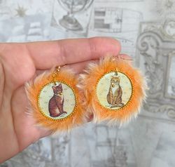 Cute handmade earrings. Image of cats, fur trim.
