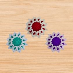 A crochet flower coaster