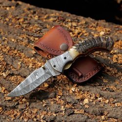 handmade damascus steel folding blade knife (ram horn handle)