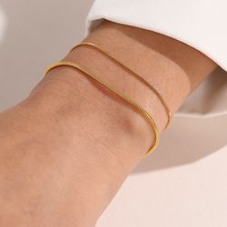 gold stainless steel snake chain bracelet for women: charm bracelet in summer 2022 jewelry trends wholesale