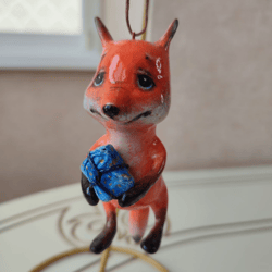 A fox with a gift