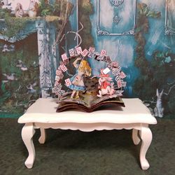 open book. dollhouse miniature.miniature for a dollhouse.1:12 scale.