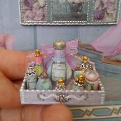 a set of bottles in a box. dollhouse accessories.1:12 scale.