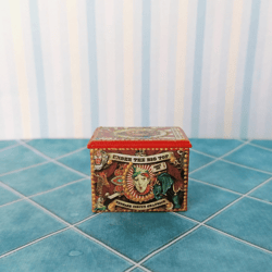 box with circus figures. dollhouse miniature.