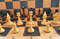 russian wooden chess pieces queens gambit style